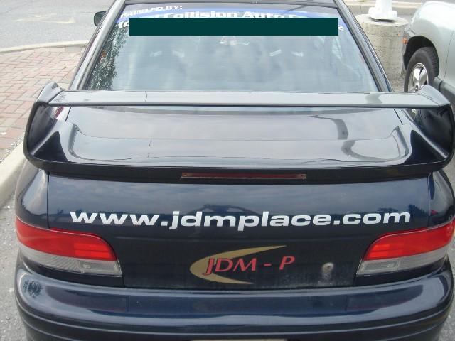 LI30001 - JDM STI Version 6 GC8 Tail lights, red and clear. Fits 93-01 Impreza sedan and coupes.